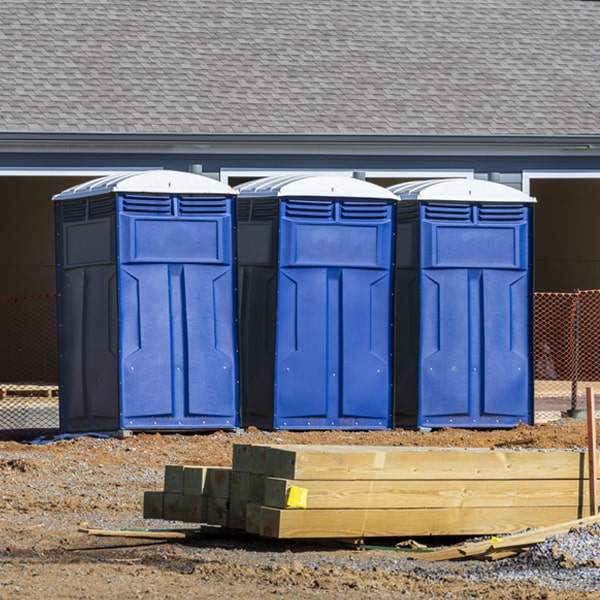 what is the maximum capacity for a single porta potty in Log Lane Village